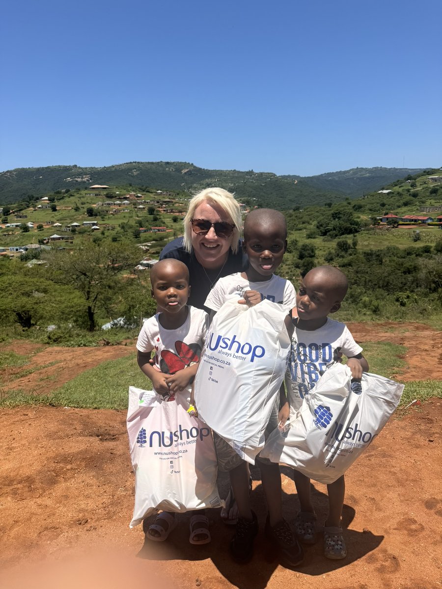 Children with their new school bags and supplies