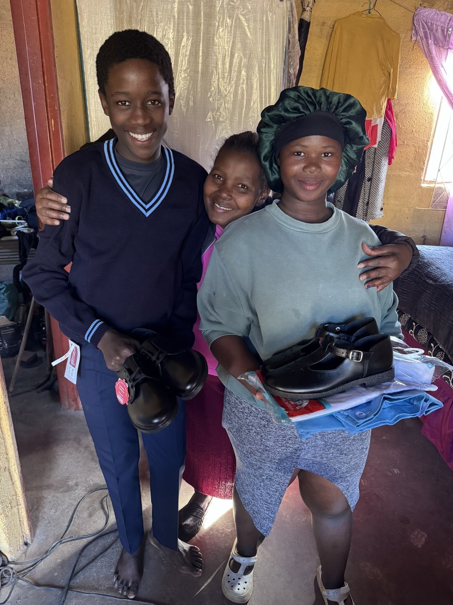 Children with their new school shoes and uniforms